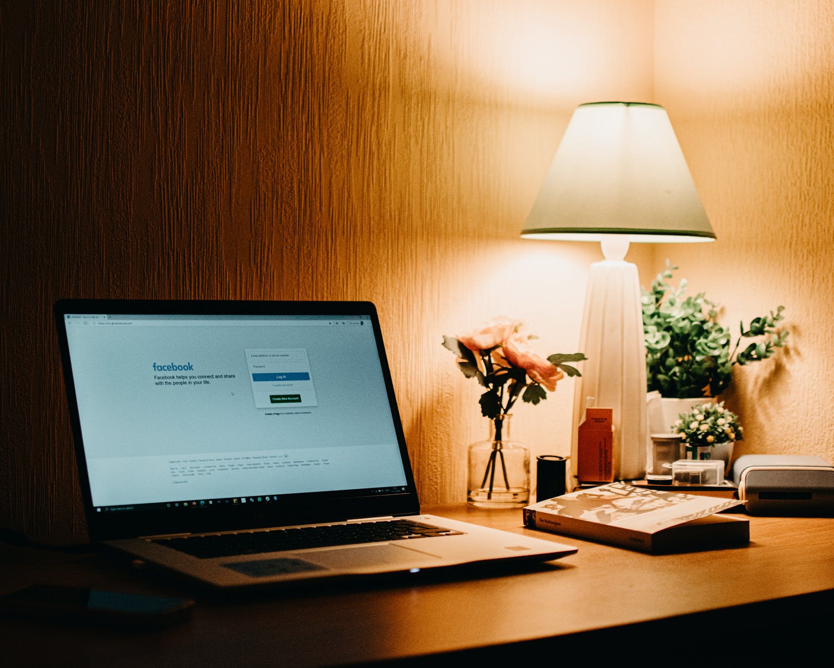 How to start a blog on Facebook in 2022?- macbook pro on brown wooden table